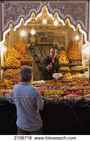 Stock Photo - Morocco, Pastry stall at souk; Marrakech. Fotosearch