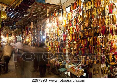 Morocco, People in front of shoe stalls in souk; Marrakesh View Large Photo Image Stock Image - Morocco, People in front of shoe stalls in souk; Marrakesh. Fotosearch