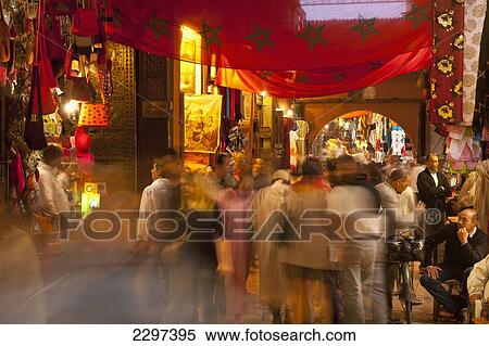 Morocco, People walking through souks in early evening; Marrakesh View Large Photo Image Stock Photography - Morocco, People walking through souks in early evening; Marrakesh. Fotosearch