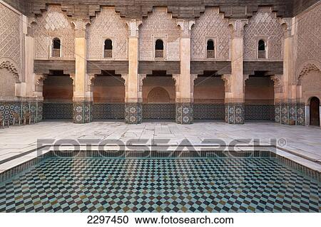 Stock Image - Morocco, Pool in courtyard of Ben Youssef Medersa; Marrakesh. Fotosearch
