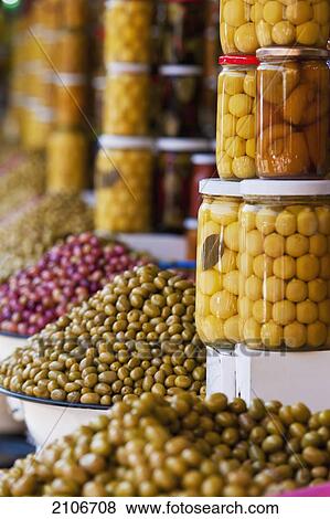 Stock Photo - Morocco, Preserved fruits and vegetables for sale; Marrakech. Fotosearch
