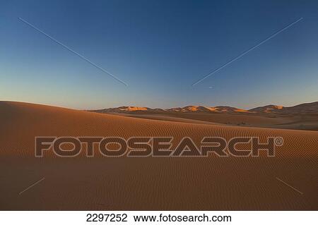 Morocco, Sand dune at dawn near Merzouga in Sahara Desert; Erg Chebbi area View Large Photo Image Stock Image - Morocco, Sand dune at dawn near Merzouga in Sahara Desert; Erg Chebbi area. Fotosearch