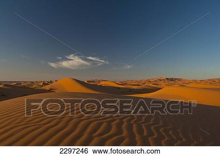 Morocco, Sand dune at dusk near Merzouga in Sahara Desert; Erg Chebbi area View Large Photo Image Stock Photograph - Morocco, Sand dune at dusk near Merzouga in Sahara Desert; Erg Chebbi area. Fotosearch