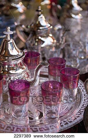 Stock Photo - Morocco, Tea pots and glasses for sale in souk; Marrakesh. Fotosearch