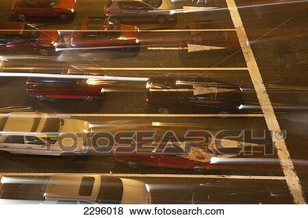 Stock Photo - Morocco, Traffic going across busy junction at night; Casablanca. Fotosearch