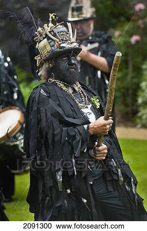 Stock Image - Morris Dancer With Black-Painted Face, Lewes, East Sussex, Uk. Fotosearch