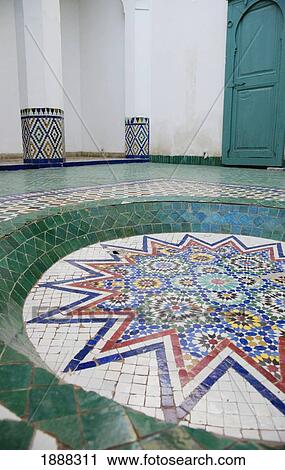 Stock Image - Mosaic Floor Tiles In A Star Design In The Museum Of Marrakesh.. Fotosearch
