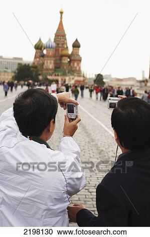 Stock Image - Moscow, Russia Tourists In Red Square. Fotosearch