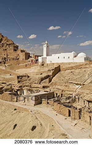 Mosque Of Chenini And Ruins Of A Berber Village In The Tataouine Province; Chenini, Tunisia, North Africa View Large Photo Image Stock Photograph - Mosque Of Chenini And Ruins Of A Berber Village In The Tataouine Province; Chenini, Tunisia, North Africa. Fotosearch
