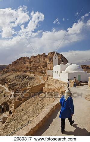Stock Photo - Mosque Of Chenini Overlooks Ruins Of A Berber Village In The Tataouine Province; Chenini, Tunisia, North Africa. Fotosearch