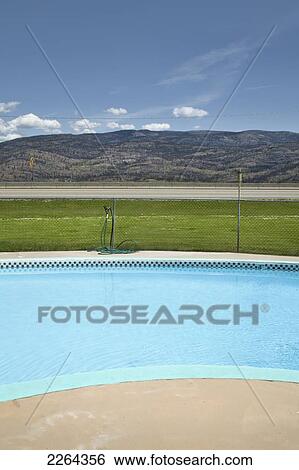 Stock Photograph - Motel swimming pool near okanagan lake; peachland british columbia canada. Fotosearch