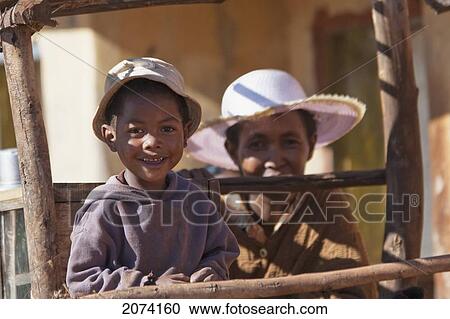 Stock Image - Mother And Her Boy In Ambalavao, Fianarantsoa Province, Madagascar. Fotosearch
