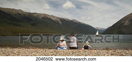 Stock Image - Mother And Kids At Lake Rotoiti; St. Arnaud New Zealand. Fotosearch