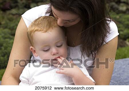 Mother Comforting Her Son; Ontario Canada View Large Photo Image Stock Image - Mother Comforting Her Son; Ontario Canada. Fotosearch