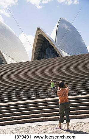 Mother Photographing Her Son Ascending Stairs In Front Of Sydney Opera House View Large Photo Image Stock Image - Mother Photographing Her Son Ascending Stairs In Front Of Sydney Opera House. Fotosearch