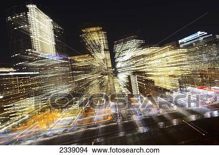 Picture - Motion Blur Of City Lights Downtown At Night; Calgary, Alberta, Canada. Fotosearch