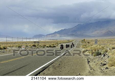 Motorbikes on Hightway 136, Route 136 near Death Valley; California, United States of America View Large Photo Image Picture - Motorbikes on Hightway 136, Route 136 near Death Valley; California, United States of America. Fotosearch