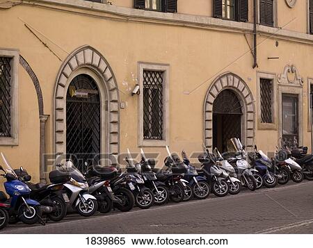 Motorcycles Parked In Front Of Old Building; Rome, Italy View Large Photo Image Stock Photography - Motorcycles Parked In Front Of Old Building; Rome, Italy. Fotosearch