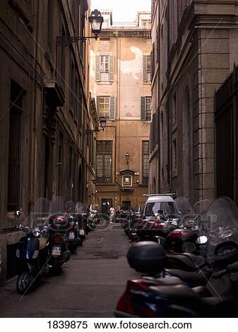 Motorcycles Parked On The Sidewalks Of Old Town; Rome, Italy View Large Photo Image Stock Photography - Motorcycles Parked On The Sidewalks Of Old Town; Rome, Italy. Fotosearch