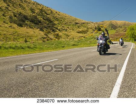 Stock Image - Motorcycling; South Island, New Zealand. Fotosearch