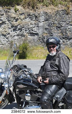 Stock Image - Motorcycling; South Island, New Zealand. Fotosearch