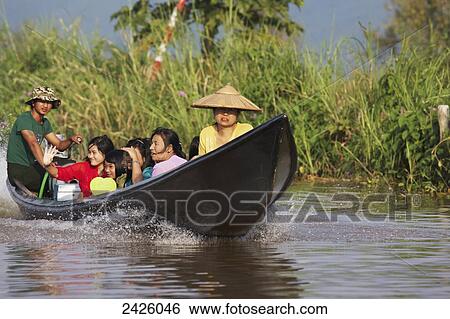 Motorized canoe on Inle Lake; Myanmar View Large Photo Image Stock Photograph - Motorized canoe on Inle Lake; Myanmar. Fotosearch