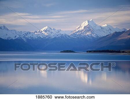 Mount Cook And Southern Alps Reflected In Lake Pukaki View Large Photo Image Stock Image - Mount Cook And Southern Alps Reflected In Lake Pukaki. Fotosearch