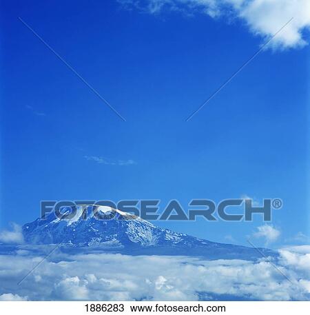 Stock Image - Mount Kilimanjaro And Clouds. Fotosearch