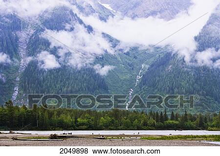 Stock Photo - Mountain, Falls And Fog, Skeena River, British Columbia. Fotosearch