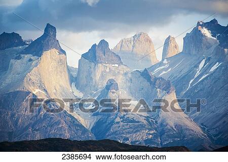 Picture - Mountain range in the distance in Torres del Paine National Park; Torres del Paine, Mallaganes, Chile. Fotosearch