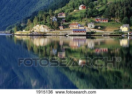 Stock Photograph - Mountain Reflected In Lake. Fotosearch