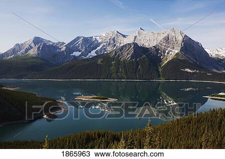 Mountain Reflection In Upper Lake; Kananaskis Country, Alberta, Canada View Large Photo Image Stock Image - Mountain Reflection In Upper Lake; Kananaskis Country, Alberta, Canada. Fotosearch