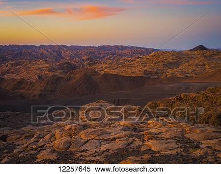 Mountain scene at sunset, near Tabuk; Saudi Arabia View Large Photo Image Stock Photography - Mountain scene at sunset, near Tabuk; Saudi Arabia. Fotosearch