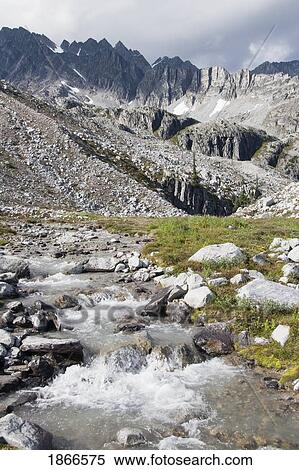 Stock Photography - Mountain Stream And Mountains; British Columbia, Canada. Fotosearch
