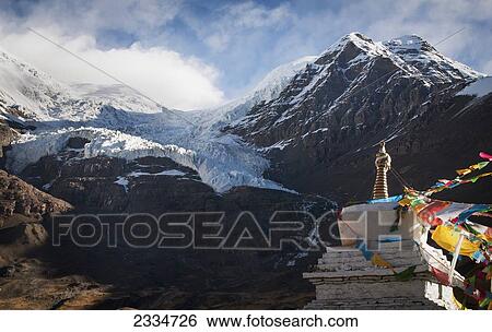 Stock Photograph - Mountain View With Part Of Stupa; Tibet. Fotosearch