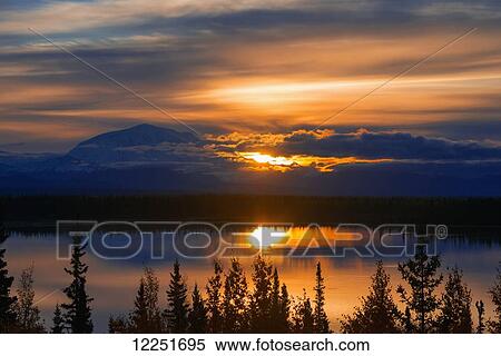 Mt. Drum reflection in Willow Lake at sunrise; Glenallen, Alaska, United States of America View Large Photo Image Stock Photography - Mt. Drum reflection in Willow Lake at sunrise; Glenallen, Alaska, United States of America. Fotosearch