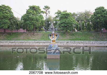 Stock Photo - Muchhalinda Pond, Mahabodi Temple, Bodhgaya, Bihar, India. Fotosearch