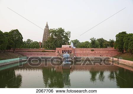 Stock Photograph - Muchhalinda Pond, Mahabodi Temple, Bodhgaya, Bihar, India. Fotosearch