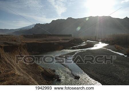 Stock Image - Mud Fort At The Confluence Of The Bamiyan And Kalu Rivers Near Sharh-E-Zohak At The Entrance To Bamiyan, Bamian Province, Afghanistan. Fotosearch