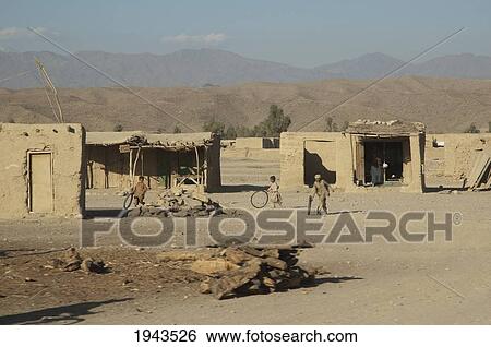 Stock Photograph - Mud Houses Along The Torkham To Jalalabad Road, Nangarhar Province, Afghanistan. Fotosearch
