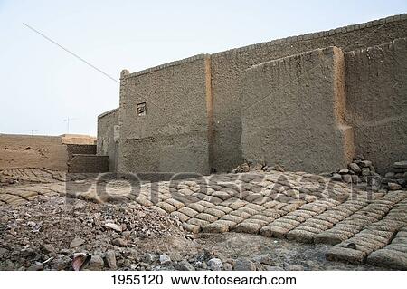 Stock Image - Mud Houses And Bricks At Timbuktu, Mali. Fotosearch