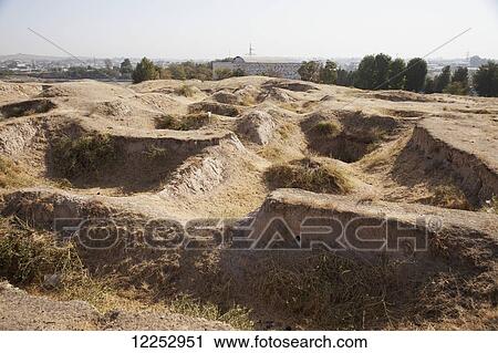 Stock Image - Mud walls of ancient Afrosiab city; Samarkand, Uzbekistan. Fotosearch