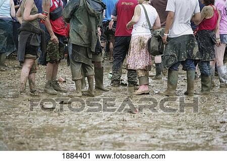 Muddy Legs At Glastonbury Festival View Large Photo Image Stock Image - Muddy Legs At Glastonbury Festival. Fotosearch