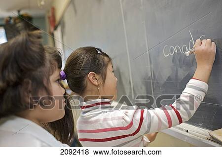 Stock Photo - Multi-Ethnic Children In An Esl School; Guelph Ontario Canada. Fotosearch