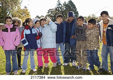 Picture - Multi-Ethnic Children Outside An Esl School; Guelph Ontario Canada. Fotosearch