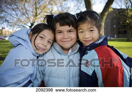 Stock Photo - Multi-Ethnic Children Outside An Esl School; Guelph Ontario Canada. Fotosearch