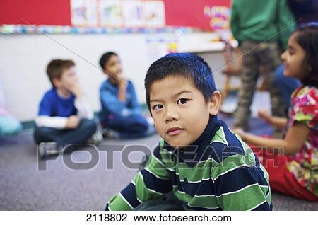 Stock Image - Multi-Ethnic New Canadian Children In An Esl School; Guelph Ontario Canada. Fotosearch