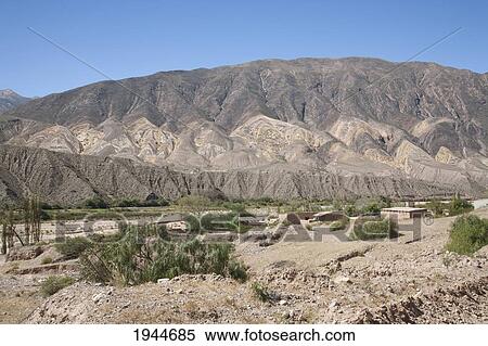 Stock Photography - Multicolored mountains of the Quebrada de Humahuaca between the towns of Tilcara and Hornillos, Jujuy, Argentina. Fotosearch