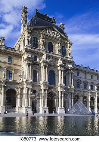 Stock Image - Musee Du Louvre With Small Glass Pyramid.. Fotosearch