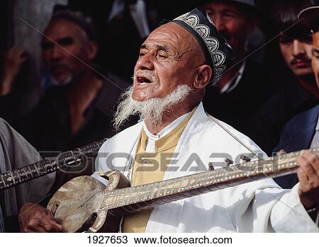 Musician At Hotan Sunday Market View Large Photo Image Stock Image - Musician At Hotan Sunday Market. Fotosearch